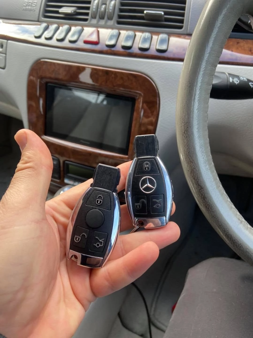 Two Mercedes-Benz S-Class remote keys inside the vehicle in Stratford-upon-Avon