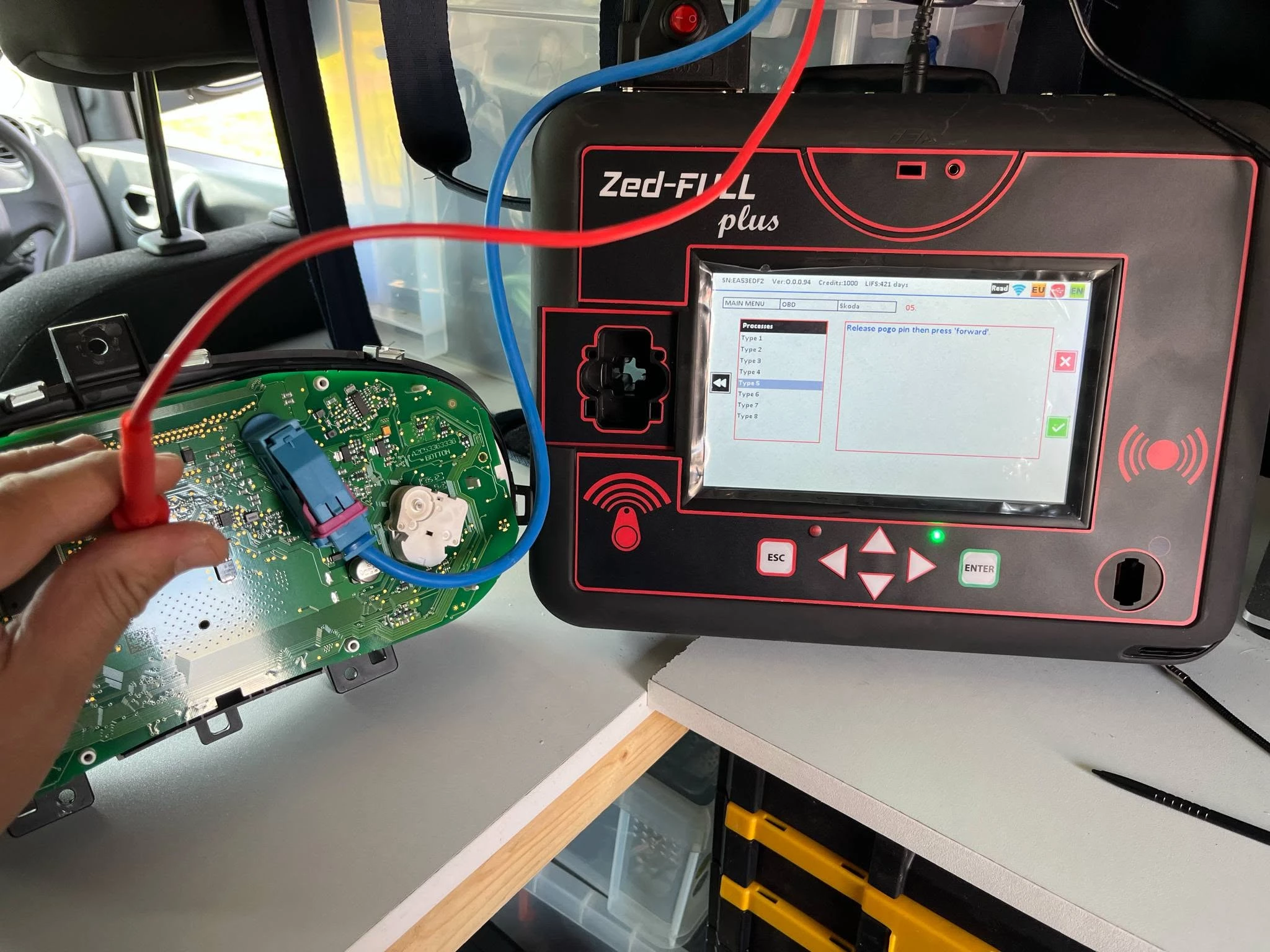 SEAT Ibiza instrument cluster electronics connected to specialist key programming equipment during a locksmith job in Bromsgrove